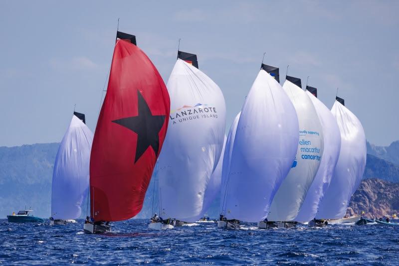 The RC44 fleet flying their gennakers, RC44 Porto Cervo Cup photo copyright Nico Martinez / 44Cup taken at Yacht Club Costa Smeralda and featuring the RC44 class