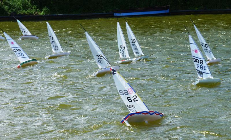 RC Laser National Champion Derek Priestley (670) leading the fleet Fairhaven TT photo copyright Robert Wheeler / www.rclasers.com taken at Blackpool & Fylde Model Boat Club and featuring the RC Laser class