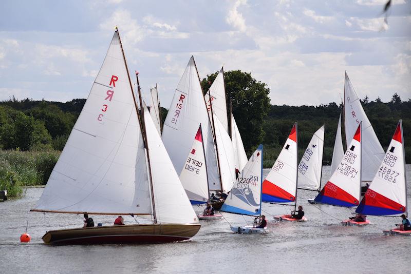 A busy river during Horning Sailing Club Regatta Week 2022 photo copyright Holly Hancock taken at Horning Sailing Club and featuring the Rebel class