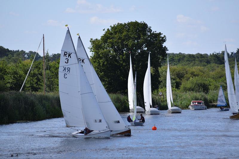 Reedlings in gusty conditions during Horning Sailing Club Regatta Week 2022 photo copyright Holly Hancock taken at Horning Sailing Club and featuring the Reedling class