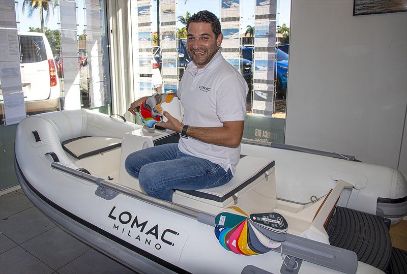 Alessandro Vicinanza displays all the options for colour on deck and below, and the pontoon displays all the colours available on the tubes of your Lomac. - photo © John Curnow