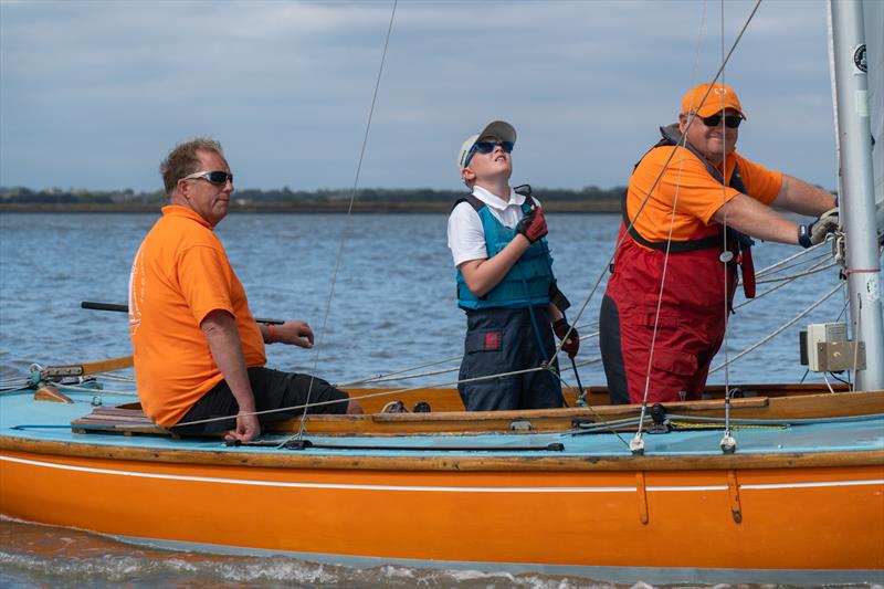 Justin Waples on the RCOD Cormorant on Day 4 of Burnham Week 2025 photo copyright Petru Balau Sports Photography / sports.hub47.com taken at Royal Corinthian Yacht Club and featuring the Royal Corinthian One Design class