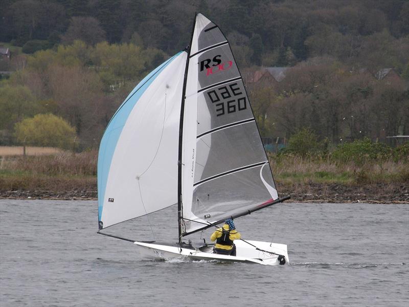 Brave Andy Todd flying his spinnaker on such a windy day during the Border Counties Midweek Sailing at Shotwick photo copyright Brian Herring taken at Shotwick Lake Sailing and featuring the RS100 class
