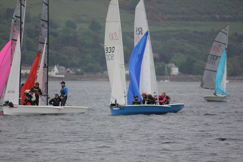 Slipping up the inside, Robbie Burns and Viki Simpson in RS 200 1632 at the Harken One Design Regatta at Largs Sailing Club photo copyright Zoe Linton taken at Largs Sailing Club and featuring the RS200 class