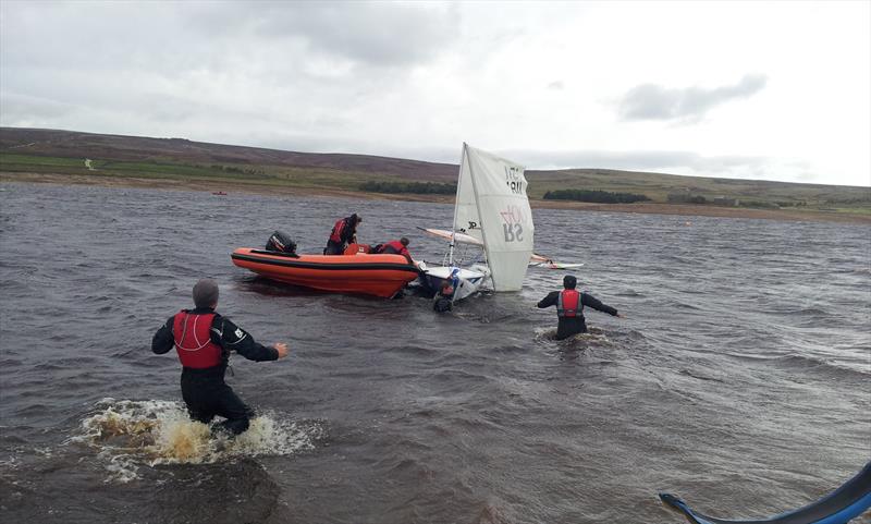 An RS400 broken mast during the Windward-Leeward and RS400 Open at Yorkshire Dales photo copyright Dave Baxter taken at Yorkshire Dales Sailing Club and featuring the RS400 class