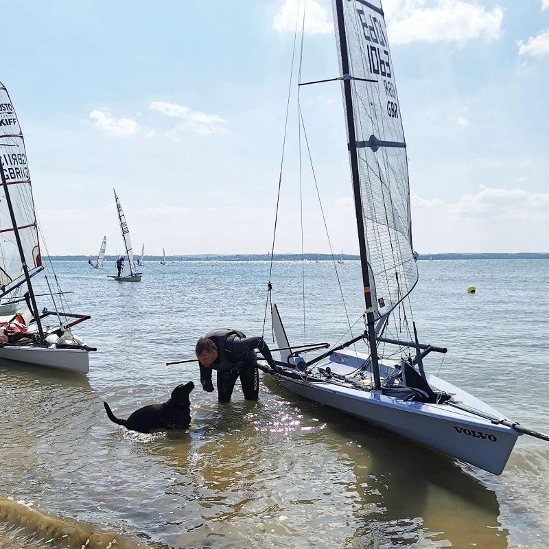 RS700s at the Stokes Bay SC Skiff Open: Winner Theo Galyer with his dog Skye  photo copyright Etta Speight taken at Stokes Bay Sailing Club and featuring the RS700 class