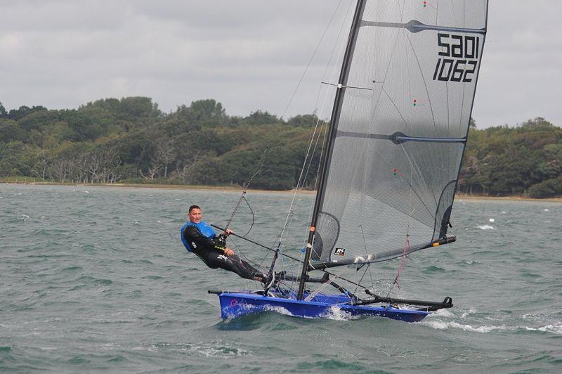 Matt Carter in the Lymington Dinghy Regatta - photo © Polly Thornton