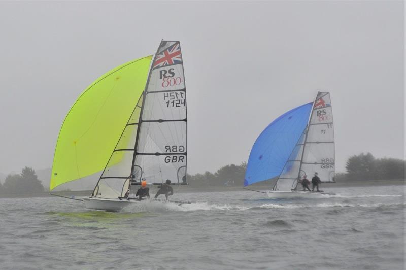 Winners Rob Gullan and Dickin Maclean (left), second place Hugh Shone and Fiona Hampshire (right) - RS800 Rooster Inland Championship photo copyright Oxford Sailing Club taken at Oxford Sailing Club and featuring the RS800 class