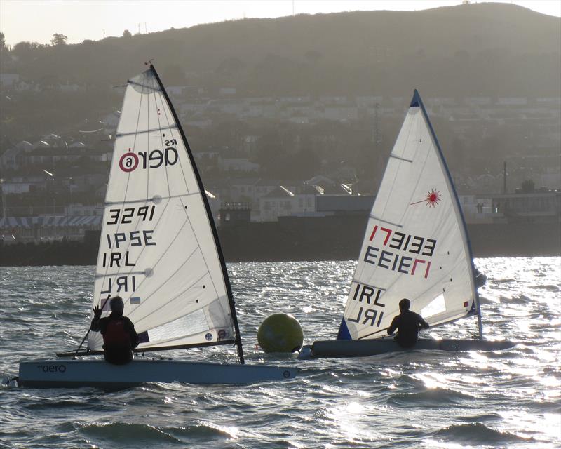 ILCA 6 Peter Hassett and Aero 6 John Phelan during the New Year's Day racing at Howth Yacht Club - photo © Neil Murphy