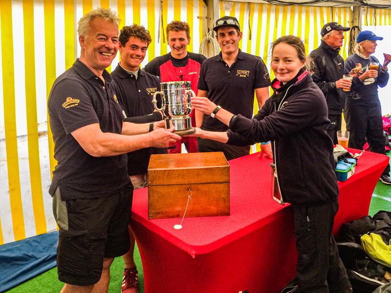Julia Egerton-Warburton Presents the RS Elite Tri-Handled Trophy to Paul Fisk and the crew of Legs Eleven photo copyright Charlie Egerton-Warburton taken at Cowes Combined Clubs and featuring the RS Elite class