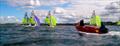 Focusing on kite work during the morning training session of the Scottish RS Feva Series © Max Blinkhorn