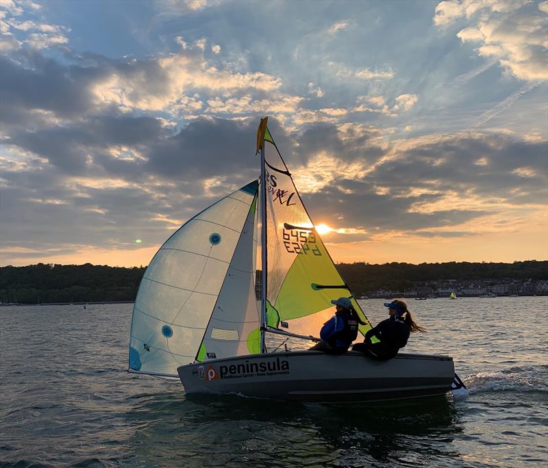 ilovesailing 2020 calendar competition: Perfect evening at the RAYC on the Menai Strait photo copyright Antony Robinson taken at Royal Anglesey Yacht Club and featuring the RS Feva class