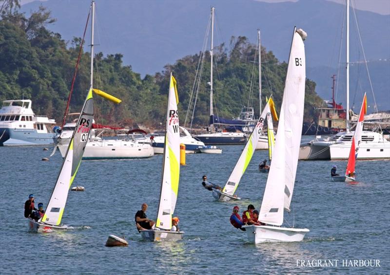 Weaving among the moored boats - 24 Hour Charity Dinghy Race photo copyright Fragrant Harbour taken at Hebe Haven Yacht Club and featuring the RS Feva class