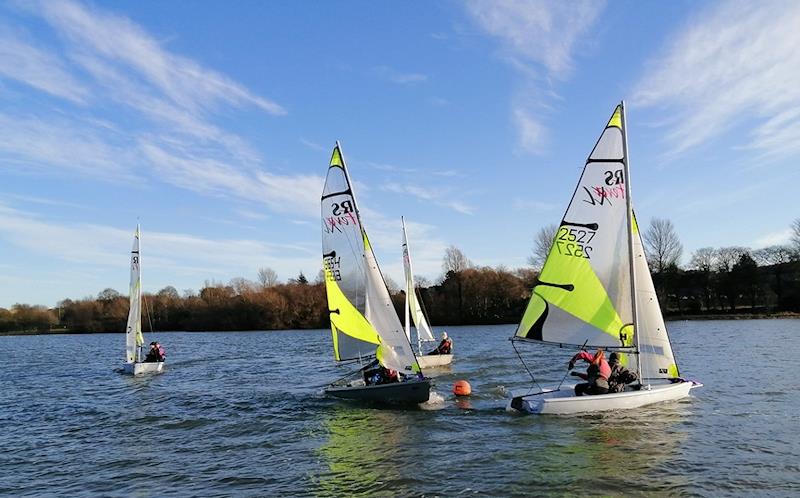 Kate and Dan fending off Yuan and Emily through a windward gate in the STRA Schools Sprints at Linlithgow Loch photo copyright Tom Goodman taken at  and featuring the RS Feva class