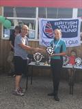 Lia Horne receives the Best School Team trophy on behalf of South Bromsgrove High School, at the OnBoard Regatta at Upton Warren © RYA