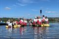 Fun and teamwork aboard Giant SUPs at Welsh Sailing OnBoard Festival &copy; RYACW
