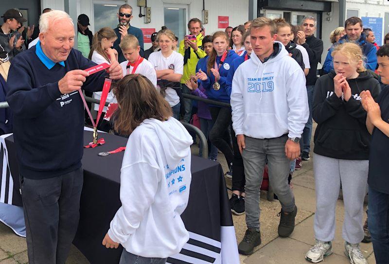 Dudley Davies presents prizes at the London Youth Games photo copyright RYA taken at Queen Mary Sailing Club and featuring the  class