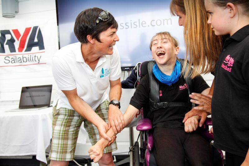 Natasha Lambert is surprised by Dame Ellen MacArthur at today's Sea and Summit Challenge press reception photo copyright Paul Wyeth / www.pwpictures.com taken at  and featuring the RYA Sailability class