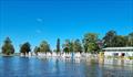 Sabots lined up along the foreshore at Teralba Amateur Sailing Club during the 58th Sabot National Championship © Rohan Nosworthy