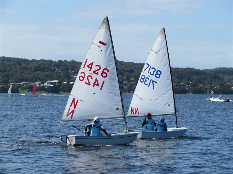 Up racing 1426 Aerial (Lily and Harry Mercer) and 7138 White Pearl (Luke Mercer and Mary Lou Doolan). White Pearl 2021/22 NSW Sabot 2-Up Champion - 2021-22 Sabot NSW State Championship photo copyright Col Skelton taken at Teralba Amateur Sailing Club and featuring the Sabot class