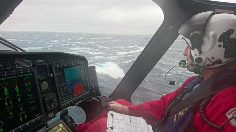 Chief Pilot Roger Hortop looks out on the 60kt winds and 5metre plus sea state from where four sailors were rescued by Westpac Helicopter Trust crews photo copyright Auckland Rescue Helicopter Trust taken at  and featuring the  class