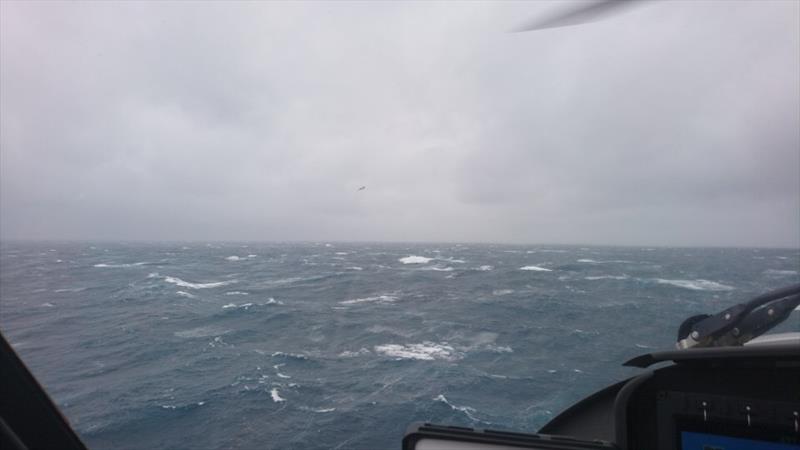 A P3 Orion from the Royal New Zealand Air Force was the first aircraft on the scene and remarkably was able to drop and position a liferaft close to the four sailors in the swimming in water - photo © Auckland Rescue Helicopter Trust