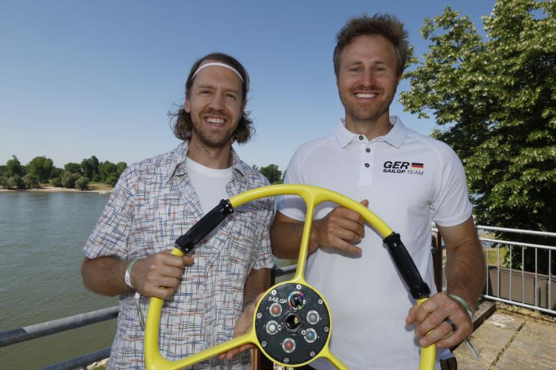 Four-time F1 World Champion Sebastian Vettel and double Olympic sailing bronze medallist Erik Heil at the Germany SailGP announcement photo copyright Norbert Schmidt taken at  and featuring the  class