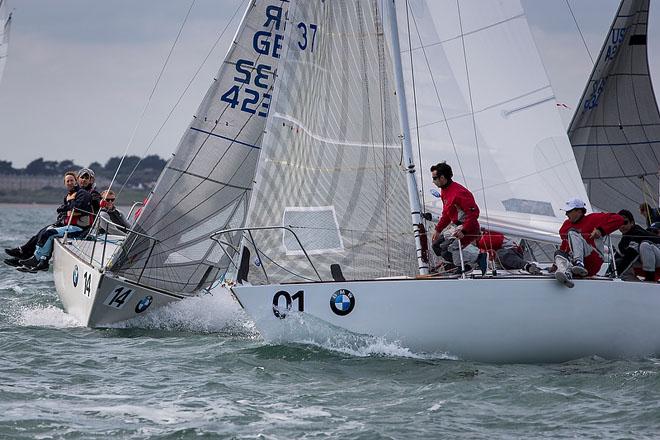 Howth Yacht Club, Co. Dublin, Ireland; Wednesday 28th August 2013: Defending world champion Mauricio Santa Cruz from Rio de Janeiro and his crew on Bruschetta slip in ahead of Jim Anderson’s Boomerang during yesterday’s racing in the BMW J24 World Championships at Howth Yacht Club. © David Branigan/Oceansport http://www.oceansport.ie/