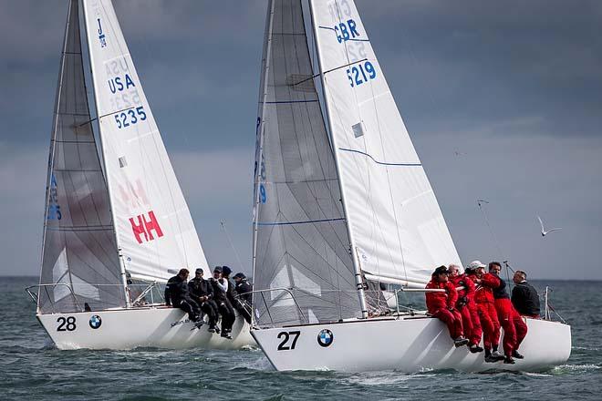 Howth Yacht Club, Co. Dublin, Ireland; Thursday 29th August 2013: British skipper Ian Southworth (right) on Il Riccio duels with Tim Healy on Helly Hansen of the United States at the front of the 40-strong BMW J24 World Championships fleet off Howth. © David Branigan/Oceansport http://www.oceansport.ie/