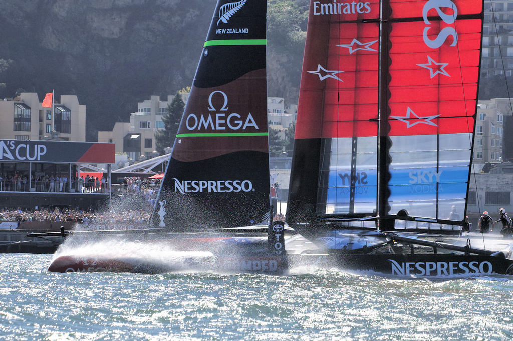 Emirates first across the line in Race Two, with the AC Park pier crowded with spectators.  - America's Cup photo copyright Chuck Lantz http://www.ChuckLantz.com taken at  and featuring the  class