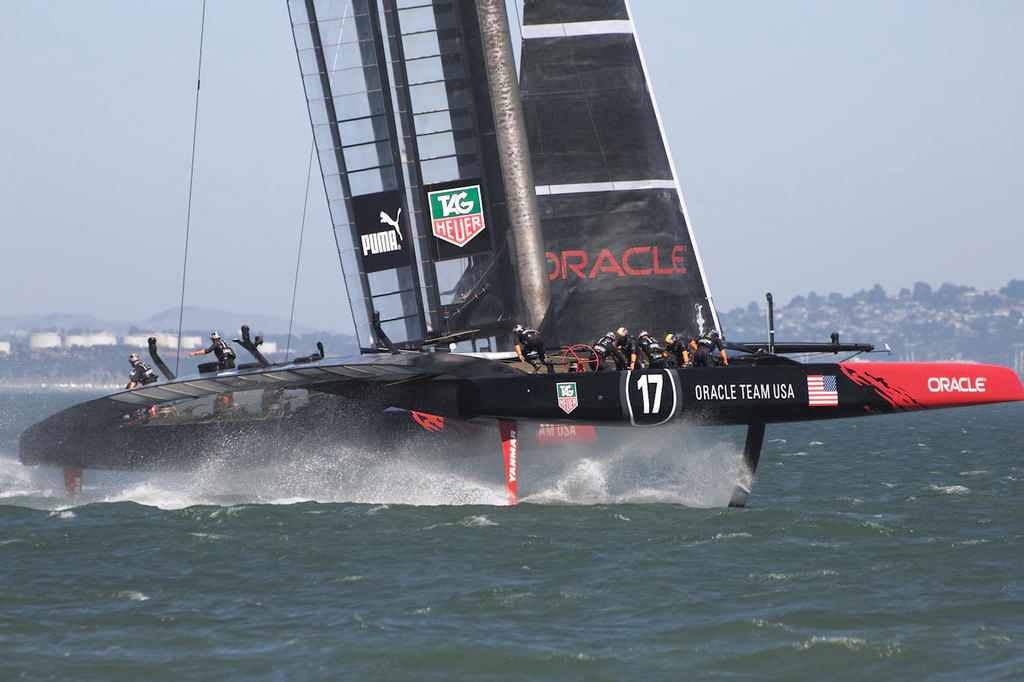 Oracle crew continue to move to the new side during the gybe.  - America's Cup photo copyright Chuck Lantz http://www.ChuckLantz.com taken at  and featuring the  class