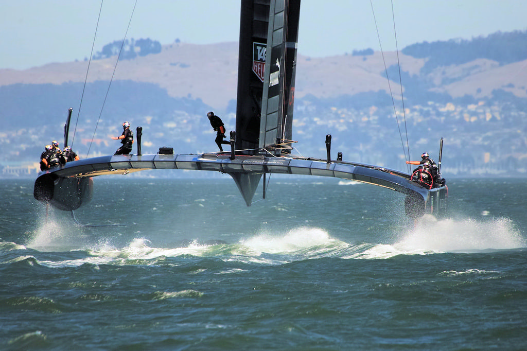 Oracle crew completing the transfer to the new side, and gets ready to do it all over again.  - America's Cup © Chuck Lantz http://www.ChuckLantz.com