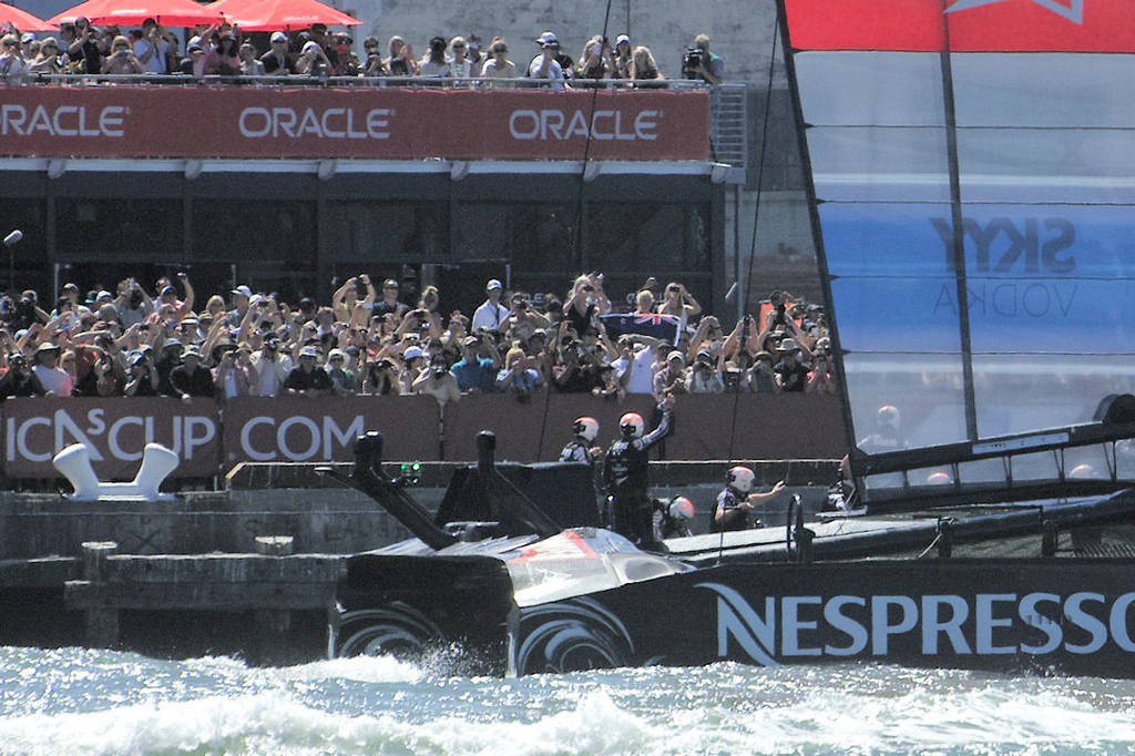 Dean Barker and crew acknowledge their fans on shore after winning their second race of the day. - America’s Cup © Chuck Lantz http://www.ChuckLantz.com