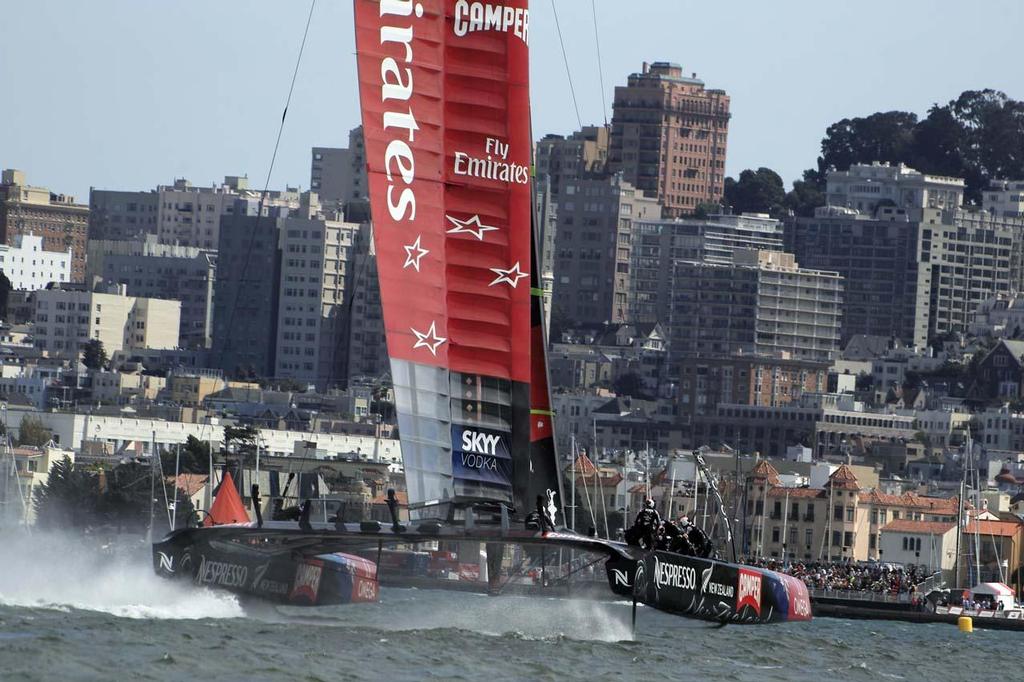 Emirates Team New Zealand flying by the skyline of San Francisco Bay during the 34th America’s Cup © Chuck Lantz http://www.ChuckLantz.com