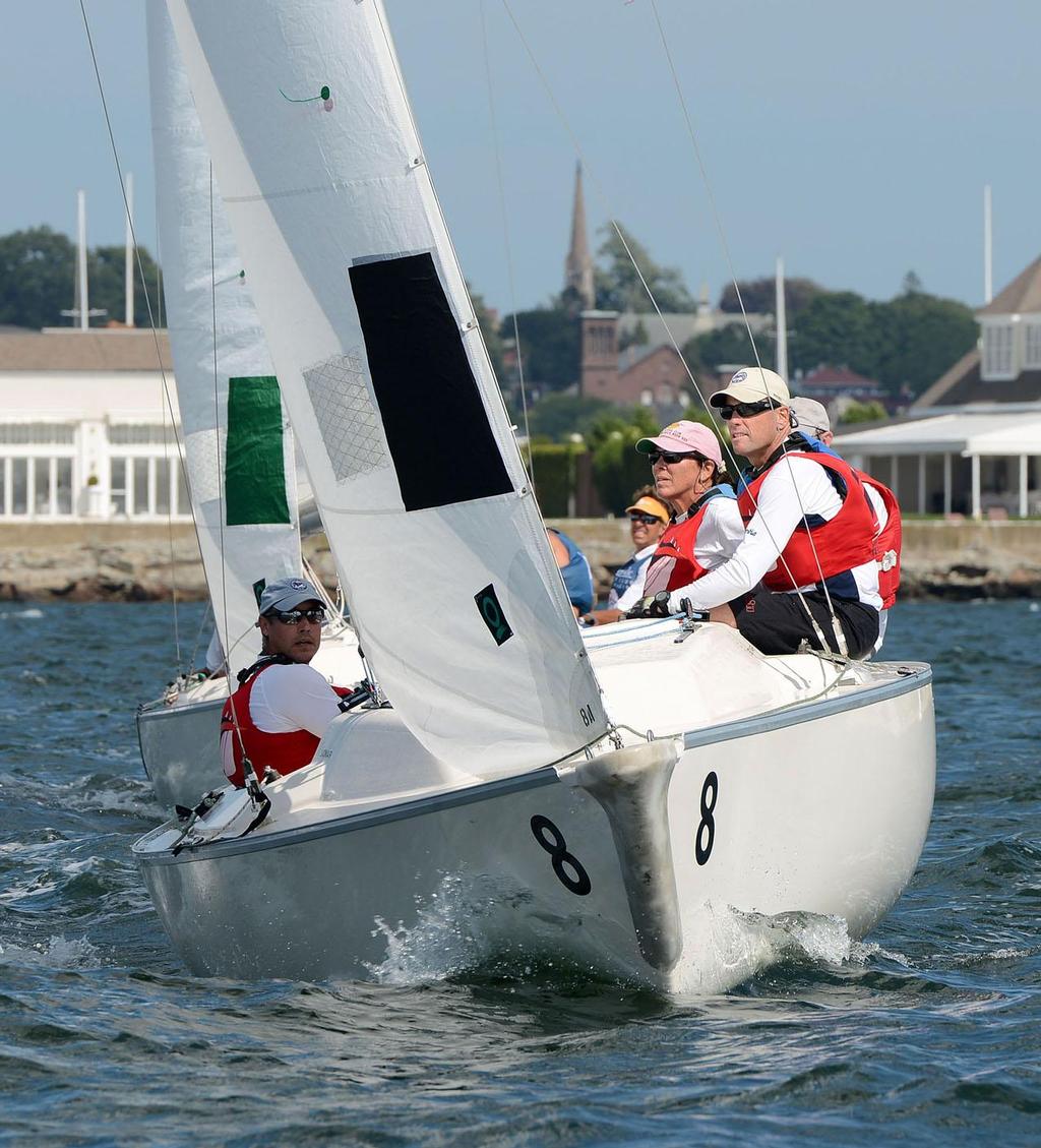 The host New York Yacht Club, including [left to right] Colin Gordon, Wendy Lotz, Peter Bendetto, and skipper Rear Commodore Phil Lotz [hidden], finished fourth in the regatta. © Stuart Streuli
