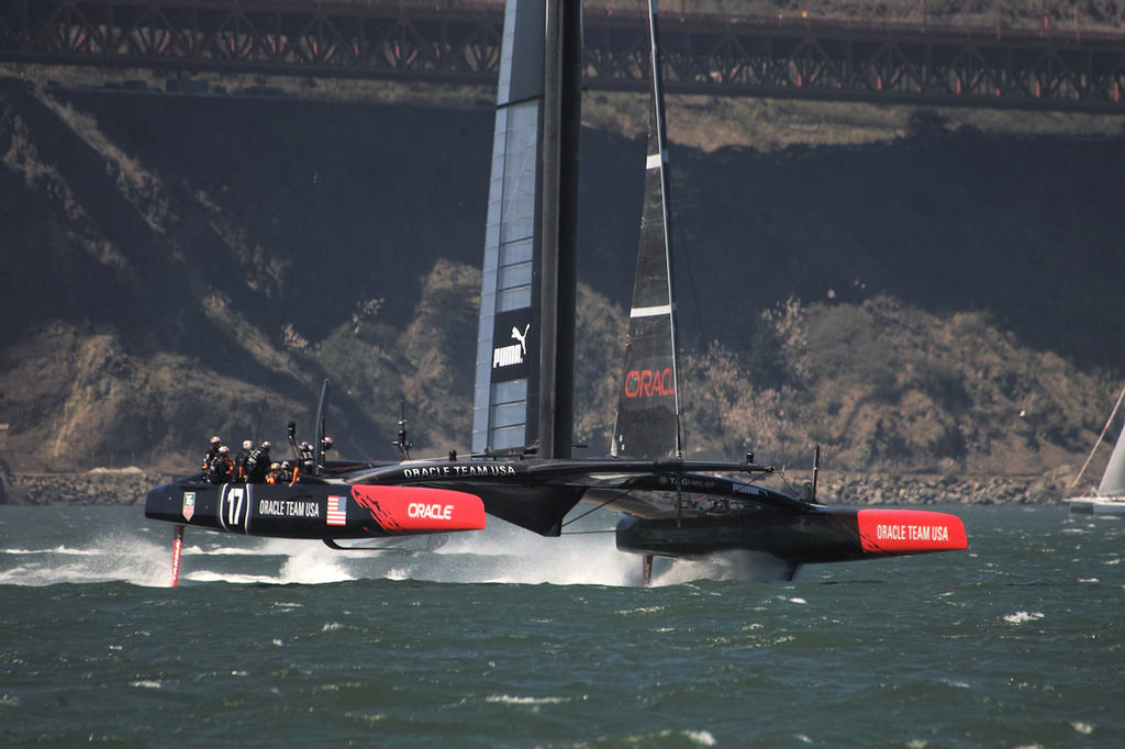 Oracle begins a run near the Golden Gate bridge. - America's Cup photo copyright Chuck Lantz http://www.ChuckLantz.com taken at  and featuring the  class