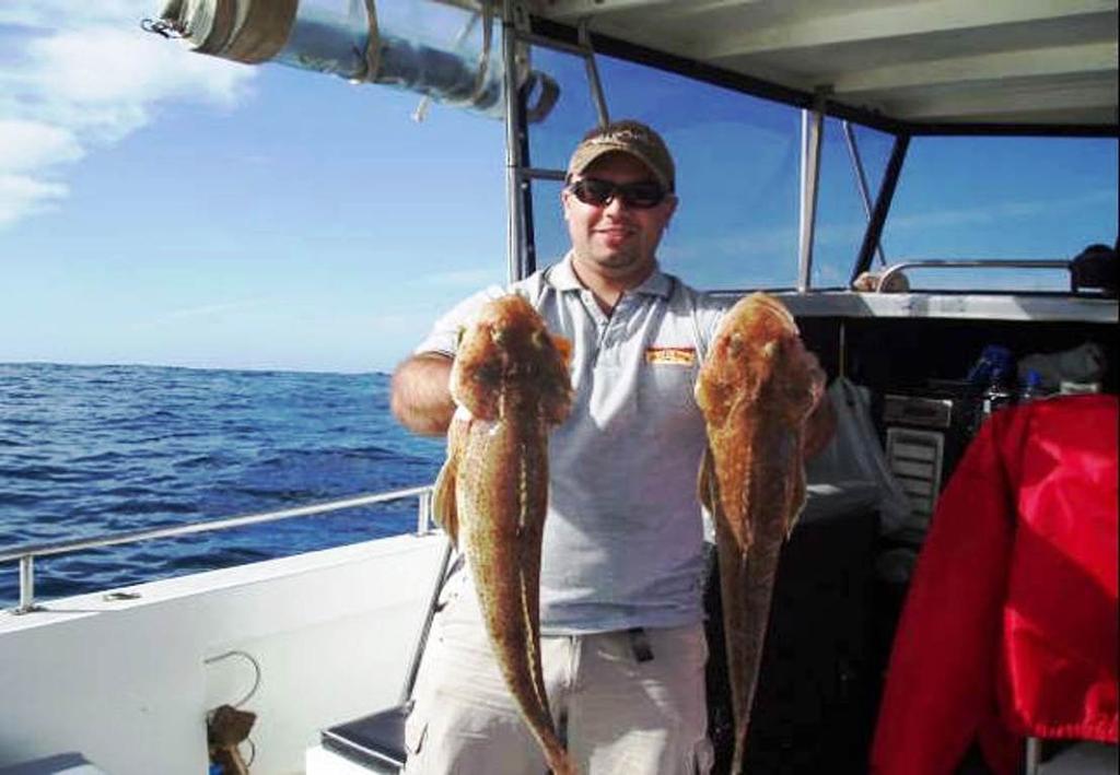 Michael McLeod with a brace of King Flathead photo copyright Carl Hyland taken at  and featuring the  class