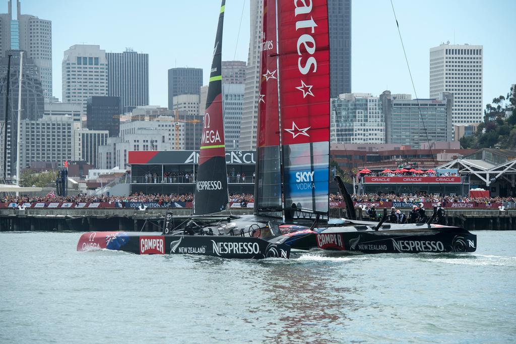 Emirates Team New Zealand nurse the boat to the finish after losing Rob Waddell and Chris Ward overboard at the top mark bear away in their first race of the Louis Vuitton finals against Luna Rossa Challenge. .17/8/2013 © Chris Cameron/ETNZ http://www.chriscameron.co.nz