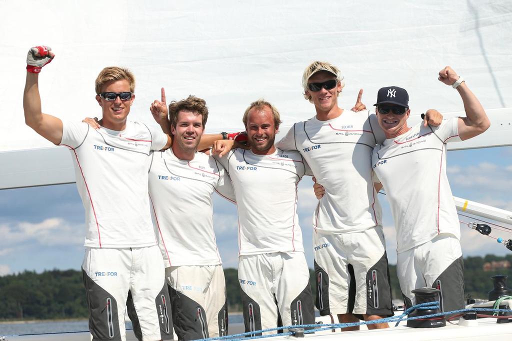 Skipper Nicolai Sehested (Right), of TRE-FOR Match Racing, celebrates with his crew after winning © Oakcliff Sailing Press