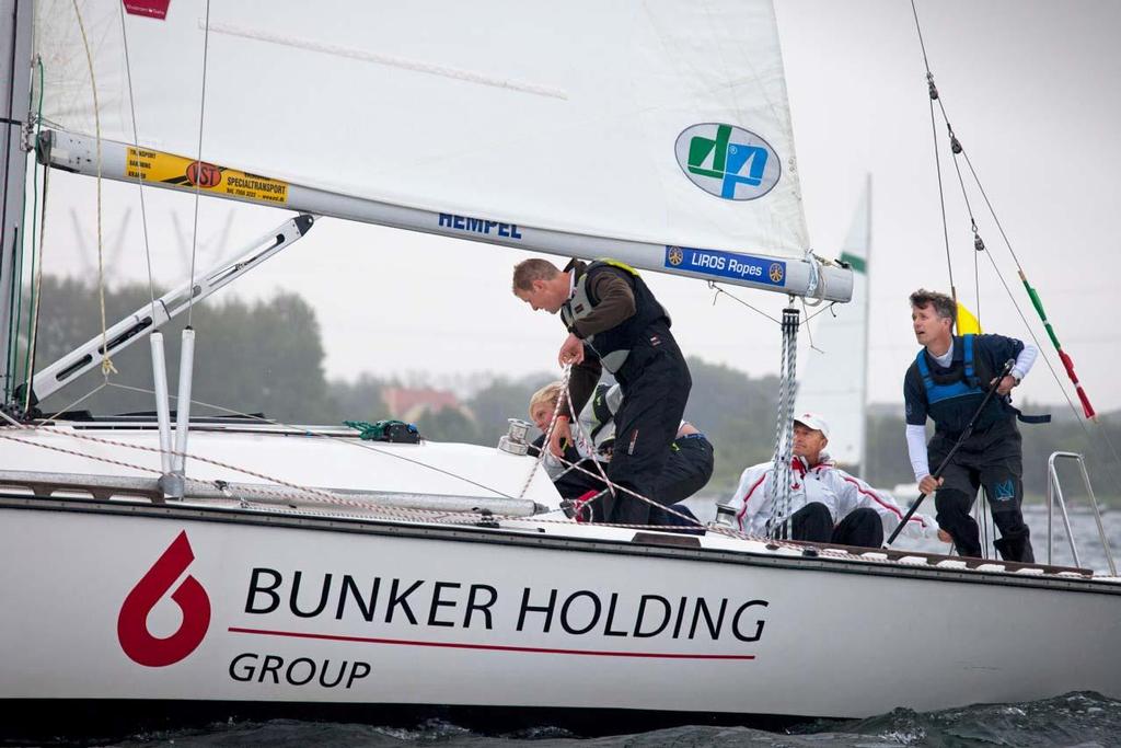 Crown Prince Frederik of Denmark and his crew of Danish Crown Prince Frederik of Denmark and his crew of Danish Olympic legends; Jesper Bank, Thomas Jacobsen, Henrik BlakskjÃ¦r and Peter Lang in action during his exhibition match against Nicolai Sehested with crew; Thomas Hedegaard, Jesper Blom, SÃ¸ren Secher and Peter Popp Wibroe, during the Nations Cup in Middelfart, Denmark. The Crown Prince crossed the line first but came second after having to make a penalty turn. ISAF Nations Cup Grand Fin photo copyright Seaclear Communications http://www.seaclearcommunications.com/ taken at  and featuring the  class