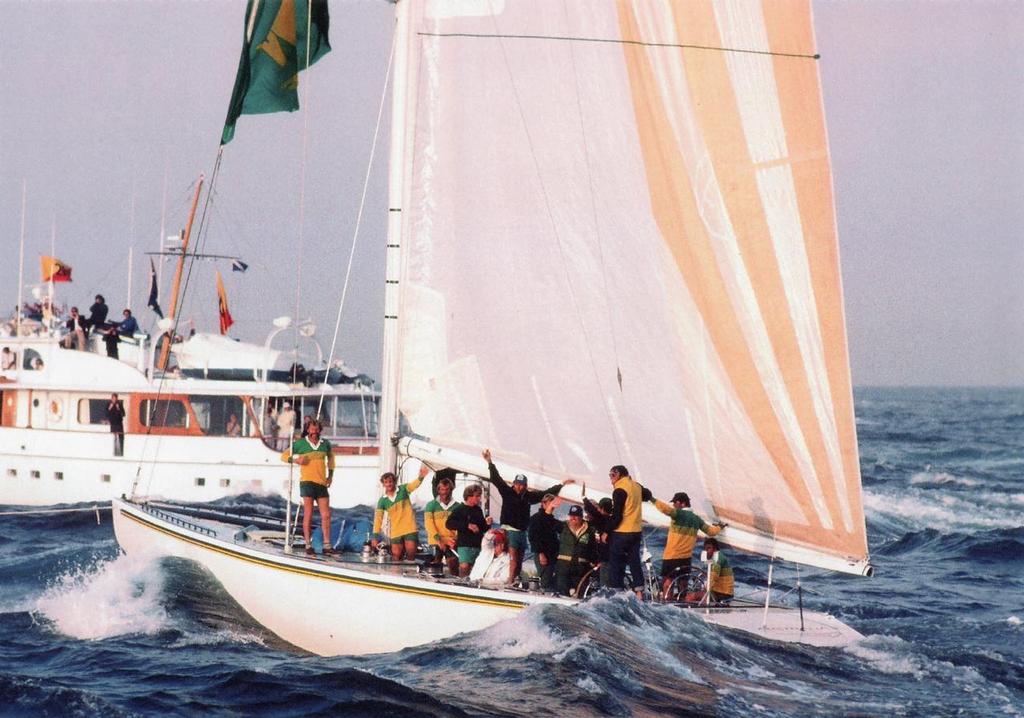 Australian II’s crew is in high spirits on the tow back to Newport after their easy Race 3 victory. © Maritime Productions LLC http://www.maritimeproductions.tv/