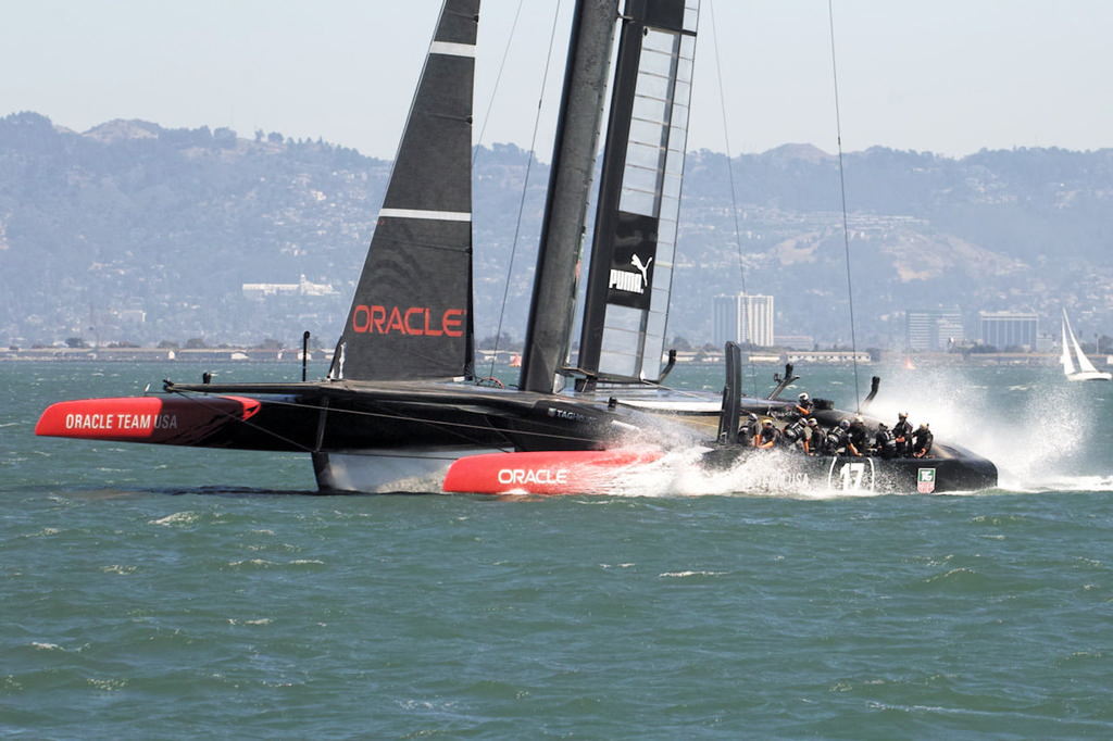 Oracle splashes down after their high-speed runs.  - America’s Cup © Chuck Lantz http://www.ChuckLantz.com