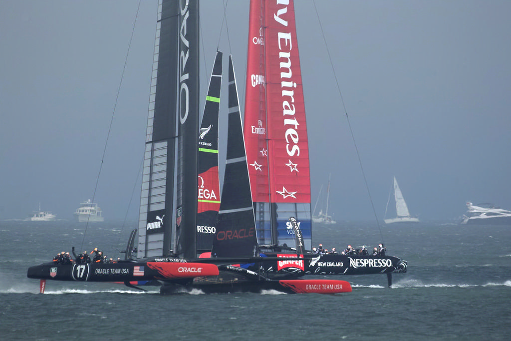 Oracle Team USA and Emirates Team NZ in close quarters - America&rsquo;s Cup, day 2 photo copyright Chuck Lantz http://www.ChuckLantz.com taken at  and featuring the  class