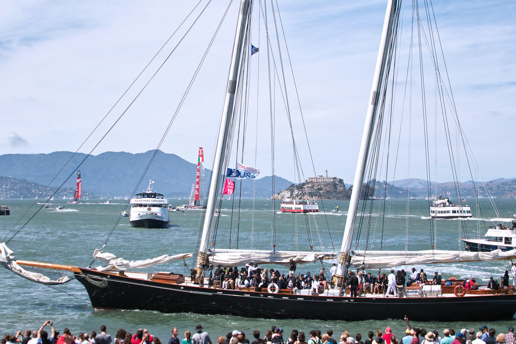 Both LVC boats head back to the start area before high wind postponement, with yacht ``America`` replica in the foreground.  - America's Cup photo copyright Chuck Lantz http://www.ChuckLantz.com taken at  and featuring the  class