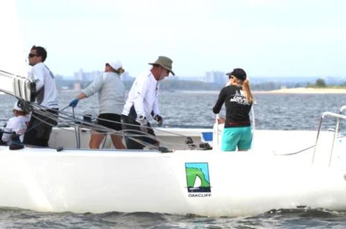 Stephanie Roble, Epic Racing (USA) on her way to victory over Taylor Canfield, USone (ISV). She ended the day with 5-0. © 2013 Andrea Watson/Manhasset Bay Yacht Club