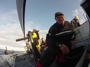 Inmarsat FleetBroadband on board eight competing yachts allowed competitors to send back audio, video, stills & blogs direct from the race course.   This is Pace pitman Craig Nutter enjoying his 7th Rolex Fastnet Race. photo copyright Royal Ocean Racing Club - RORC http://www.rorc.org taken at  and featuring the  class