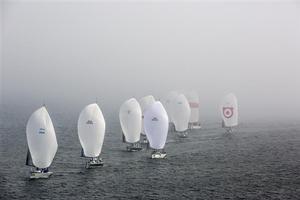 The Farr 40 fleet going through the fog photo copyright  Rolex/Daniel Forster http://www.regattanews.com taken at  and featuring the  class