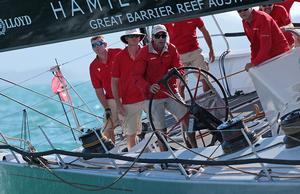 Mark Richards steering Wild Oats XI past the media boat to the start line photo copyright Crosbie Lorimer http://www.crosbielorimer.com taken at  and featuring the  class
