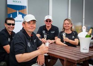Swan 60, Petite Flamme crew enjoying a glass of Lanson Champagne after finishing the 45th Rolex Fastnet Race photo copyright  RORC / Tom Gruitt taken at  and featuring the  class