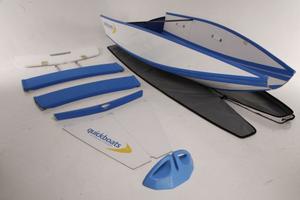 Mandatory Credit: Photo by Quickboats / Rex Features (2731171d)
 Quickboat components, product shot
 Folding Boat: Roof Rack to Water in 60 Seconds
 A revolutionary flat-pack folding boat can be unpacked in 60 seconds.
 
 Unveiled at the 2013 Sydney International Boat Show, the Quickboat boasts flexible portability where it can be transported on the roof rack of a car.
 
 Once assembled, the fibreglass and Kevlar boat is 3.7 metres long and 1.7 metres wide. It can fit four adults and can travel photo copyright SW taken at  and featuring the  class
